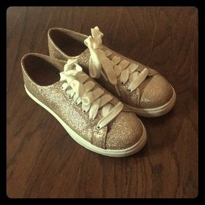 Shimmery gold sneakers